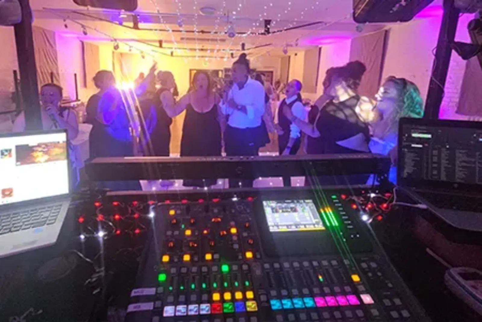 Singer performing karaoke with Xtramagic lighting and sound