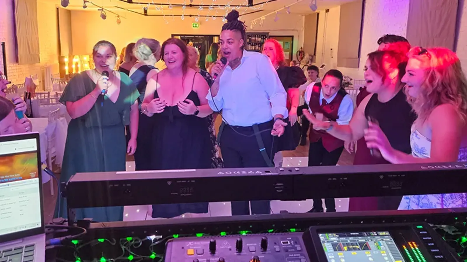 Xtramagic wedding DJ with lighting and guests dancing