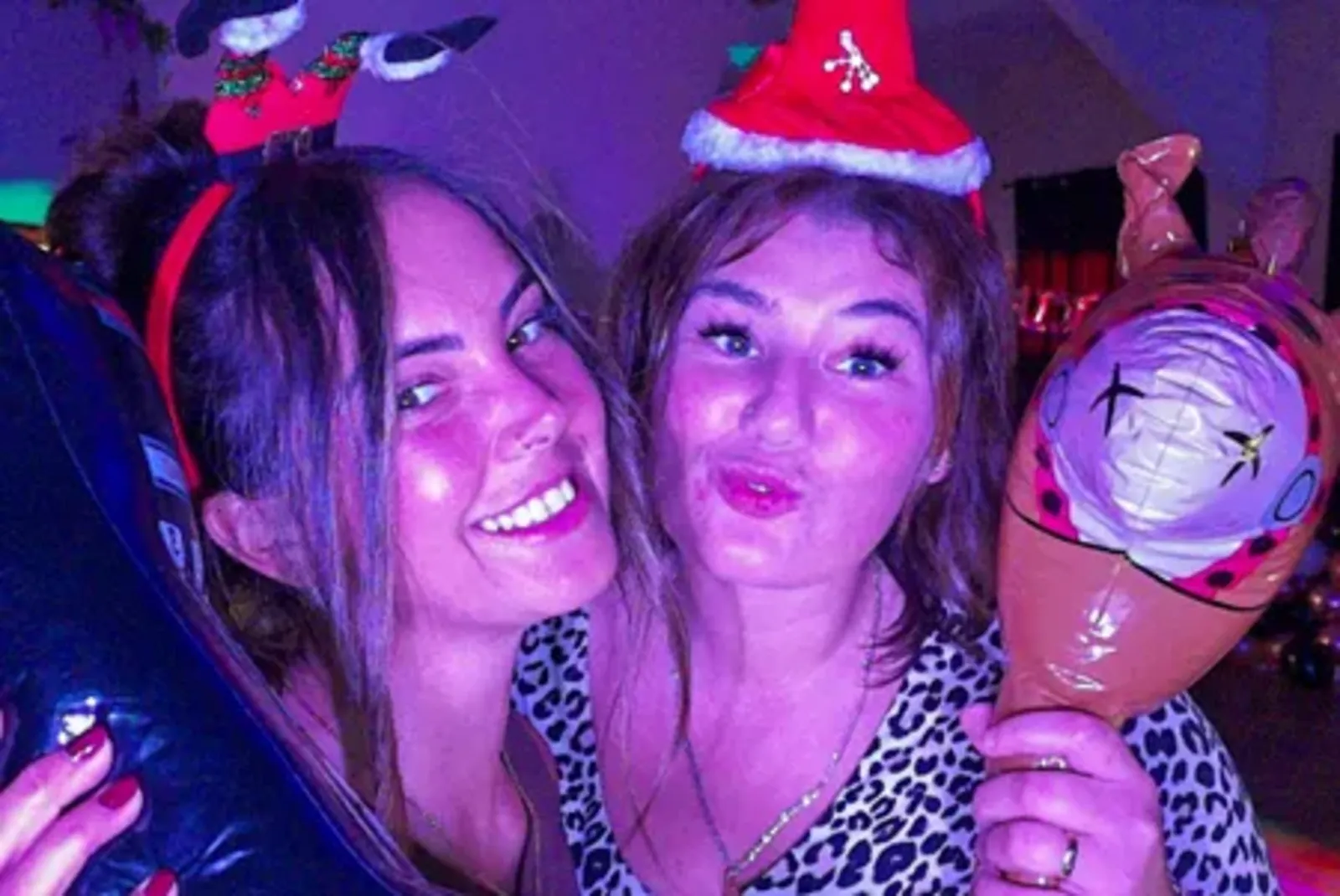 Wedding guests laughing together in the Xtramagic photobooth