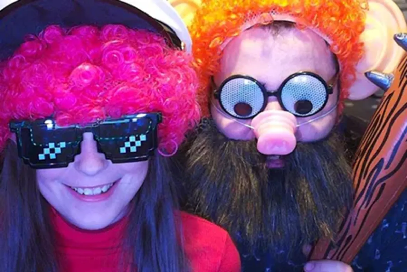 Friends singing karaoke using Xtramagic microphones and screen